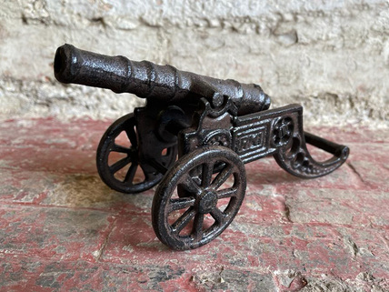 small cannon figure